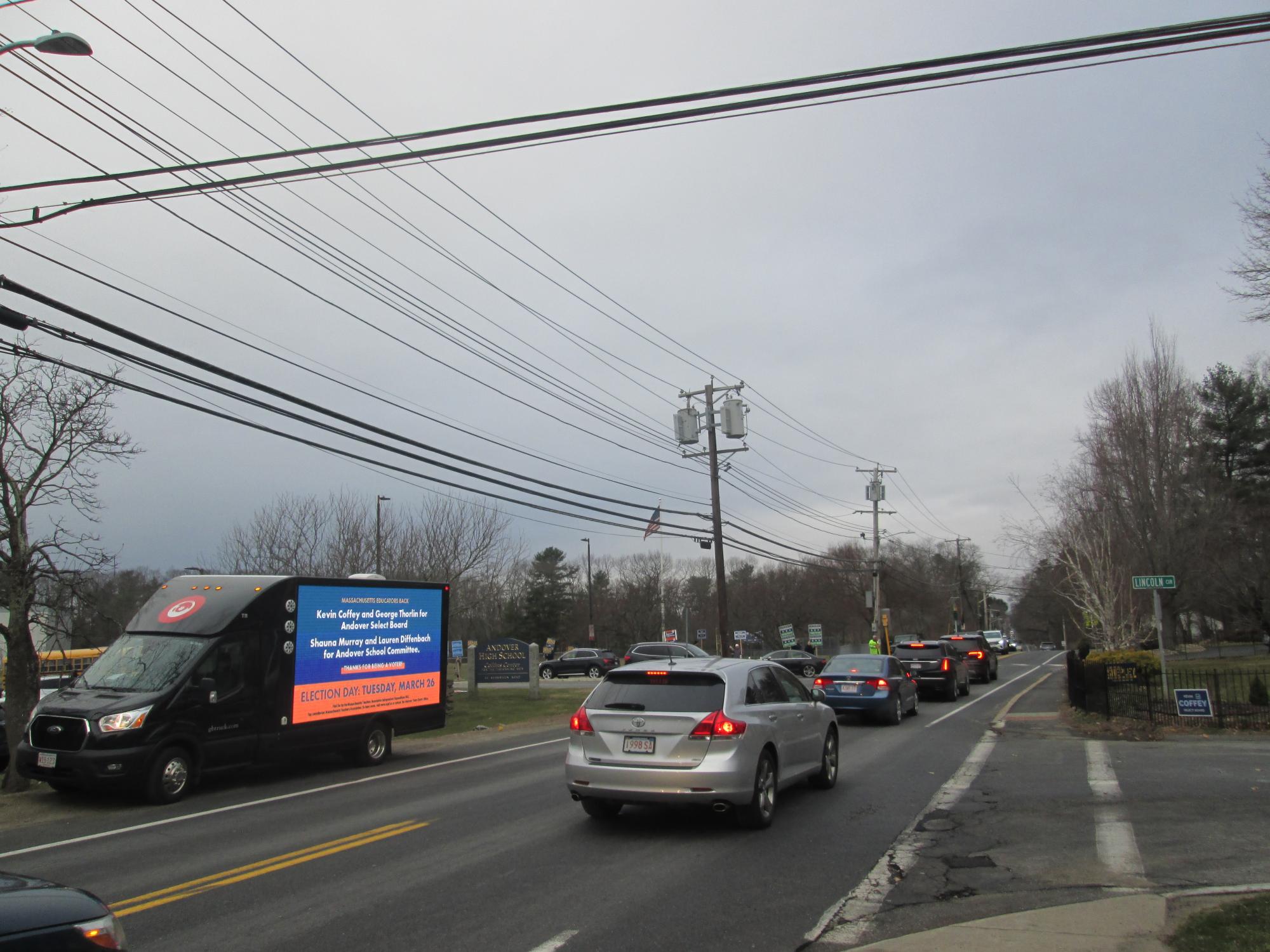 LED Digital mobile billboard truck in Andover MA during March 2024 election for School Committee and Select Board.